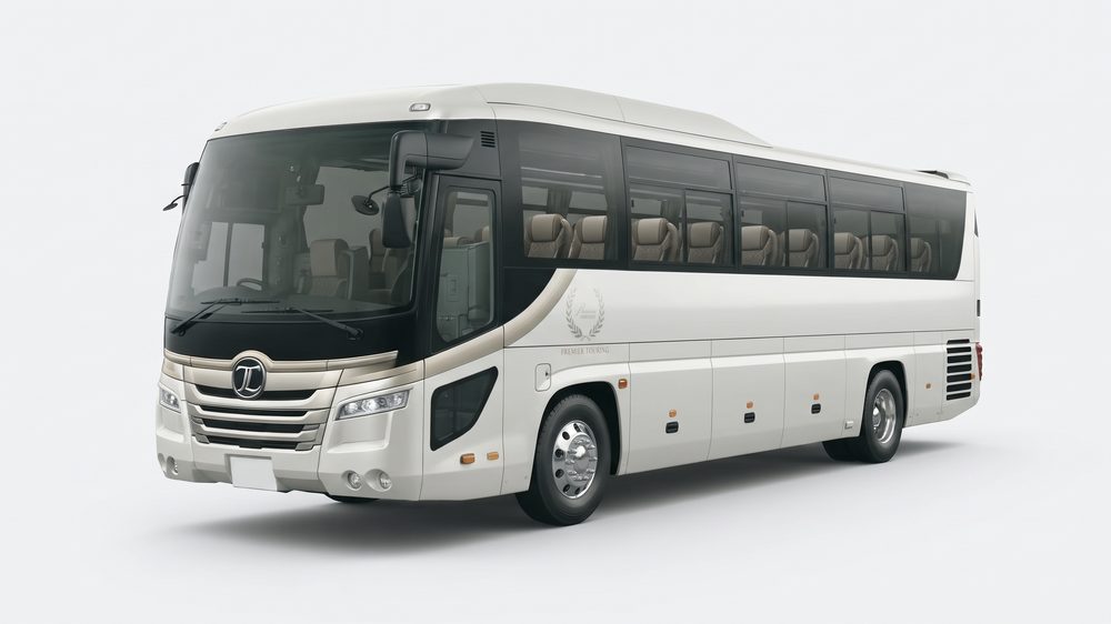 Bus pariwisata putih tampak samping